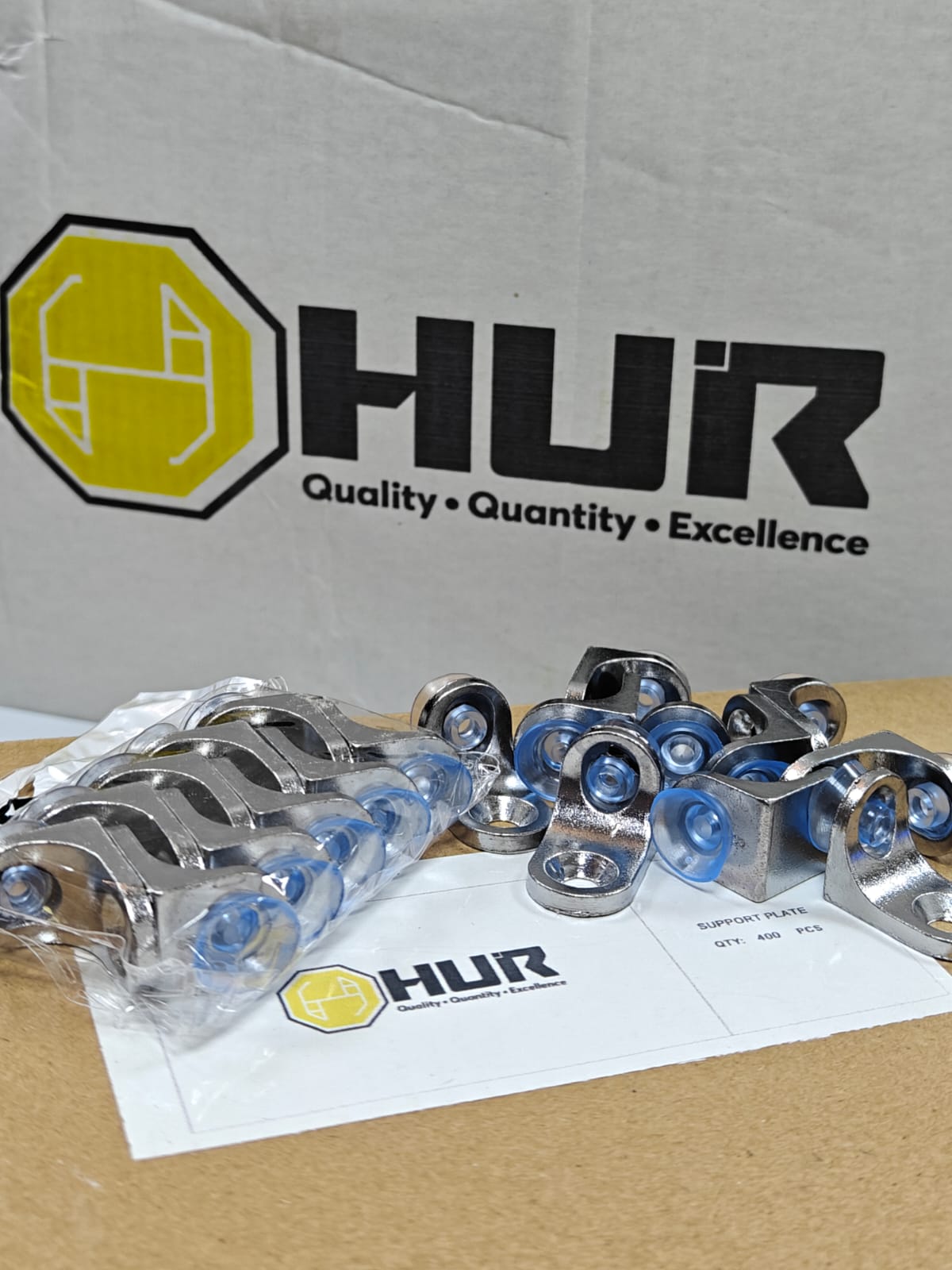 HUR furniture hinge installed on a cabinet